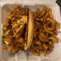 Chicken Po Boy Sandwich · Served with Cajun Fries