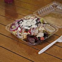 Greek Chicken Salad · Chicken breast, lettuce, red onion, cucumber, tomato, olives, and feta cheese with feta vina...