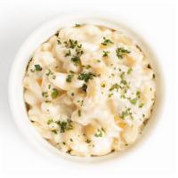 White Truffle Mac & Cheese · with Truffle Oil and a blend of Cheddar, Parmesan, and Gruyere Cheeses