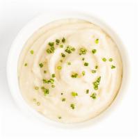 Creamy Mashed Potatoes · with Russet Potatoes, Cream, and Butter