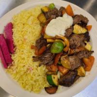 Ghallaba · Choice of beef or chicken sauteed with fresh vegetables, herbs, garlic sauce, and olive oil.