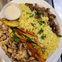 Mixed Shawarma Plate · Served with rice and a choice of soup or house salad and tahini sauce.