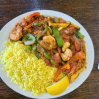 Shrimp Ghallaba · Sauteed shrimp with fresh vegetables, including mushrooms, and garlic sauce. 