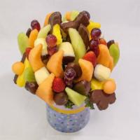 Delicious Celebration Dipped Fruit Delight · Make any celebration even more delicious with one of our signature fresh fruit arrangements!...