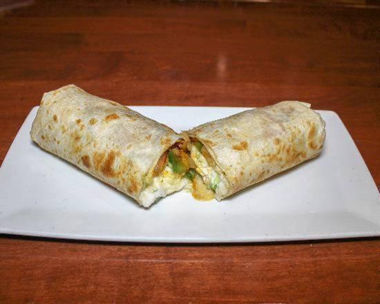 King Burrito · A large flour tortilla filled with beans, lettuce, tomato, sour cream, cheese, and your choice of meat.