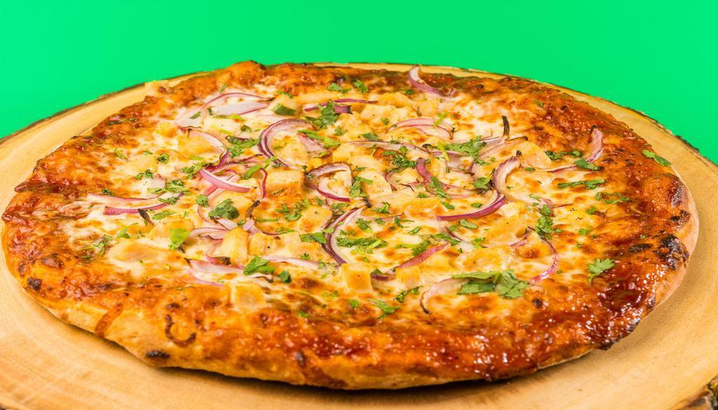  BBQ Chicken Pizza · Hand stretched dough with chicken, onion and BBQ sauce
