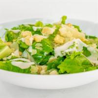  Caesar Salad ·  Crisp romaine lettuce with garlic croutons, Parmesan cheese, and Caesar dressing.