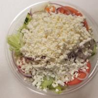Greek Salad · Peter garden salad topped with feta cheese. Served with Syrian pita and dressing on the side.