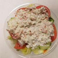 Crabmeat (Seafood) Salad · Seafood. Served with Syrian pita and dressing on the side.