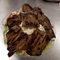 Superior Flap Meat Steak Tips Salad · Peter's marinated recipe. Served with Syrian pita and dressing on the side.