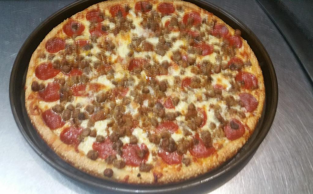 Meat Lovers Pizza · Pepperoni, meatballs, sausage, and homemade hamburger. Made fresh daily dough and house cut mozzarella and white cheddar cheese.