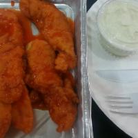Buffalo Boneless Fingers · Buffalo style lightly breaded first quality golden chicken fingers with Ken's blue cheese on...