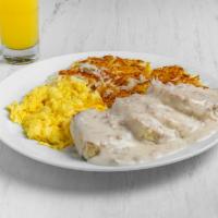 Biscuits and Eggs · 2 fluffy buttermilk biscuits smothered in sausage gravy with 3 eggs any style.