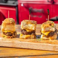 Sliders · 3 sliders with caramelized onions and 1000 Island dressing with your choice of protein beef,...