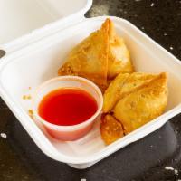 samosa {2} · served with mint chutney and  red chutney