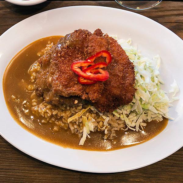 Curry Platter with Crispy Chicken · Panko-crusted chicken filets over brown rice with our rich Japanese-style savory curry sauce and wasabi coleslaw.