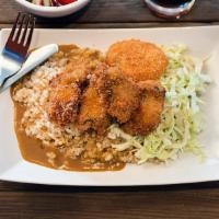 Curry Platter with Shrimp Katsu · Panko-crusted jumbo shrimp over brown rice with our rich Japanese-style savory curry sauce a...