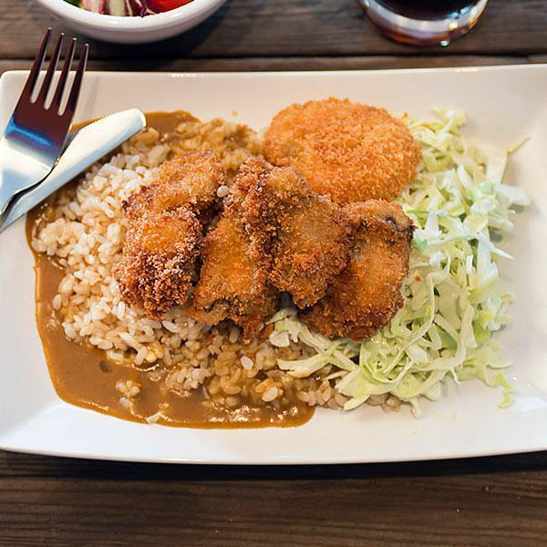 Curry Platter with Shrimp Katsu · Panko-crusted jumbo shrimp over brown rice with our rich Japanese-style savory curry sauce and wasabi coleslaw.