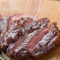 Churrasco · This 8 oz. churrasco is without a doubt the best in town, grilled and juicy inside, we love ...