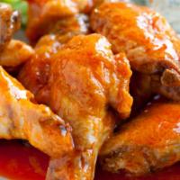 Chicken Wings · Ten pieces. With buffalo sauce and bleu cheese.