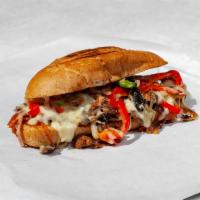 Philly Cheesesteaks Deluxe Sandwich · Grilled onions, mushrooms and bell peppers. 