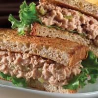 Classic Tuna Sandwich · Flaked tuna mixed with mayo, lettuce, tomato and served on a hero.