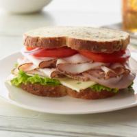 1. Turkey Sandwich · With cheese, lettuce and tomato.
