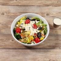 Greek Salad · With fresh mixed greens, feta cheese crumbles, tomatoes, green and black olives, red onions ...