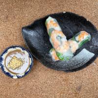 2. Goi Cuon / Summer Rolls · Summer rolls.  Shrimp, lettuce, basil and rice noodles wrapped in thin rice paper.