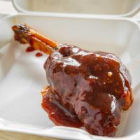 Lamb Shanks · Tender lamb snank marinated in herbs and spices.