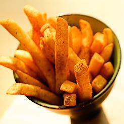 Basket of Spicy Fries · Fried golden and crispy, and dusted with Old Bay seasoning. Served with garlic & chive aioli and curry mustard dipping sauces