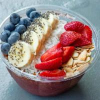 Acai Bowl · Peanut butter, banana, strawberry, blueberry, almond, granola, chia seed,  and coconut.