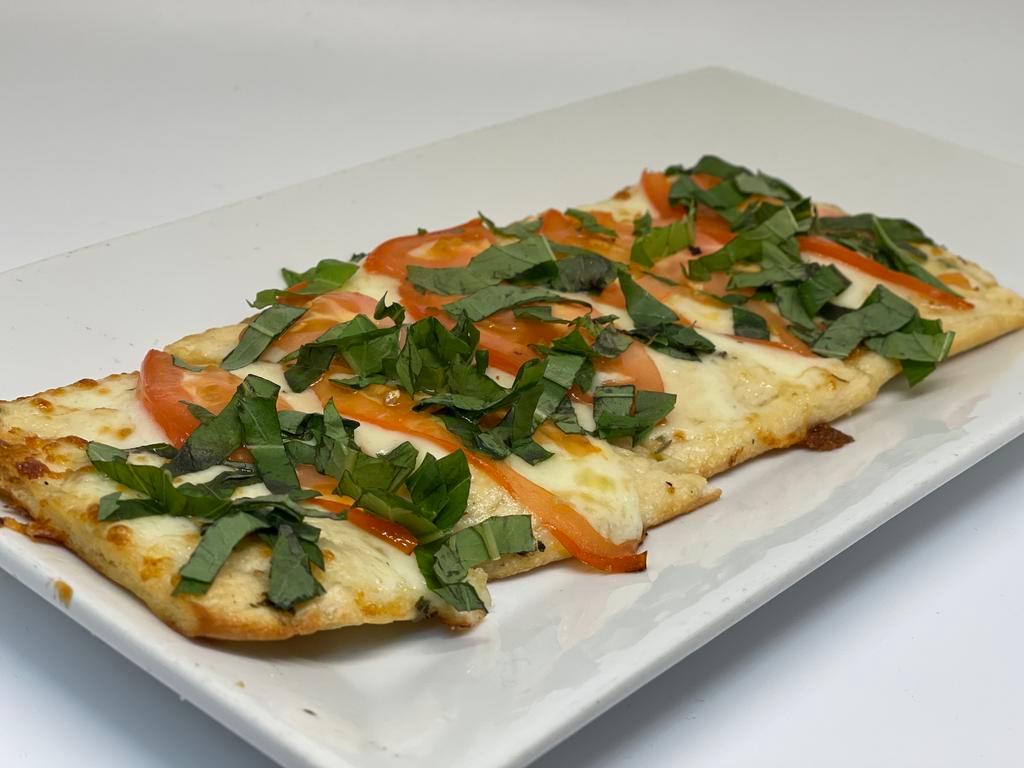 Margherita Flat Bread Starter · Garlic butter flatbread slices with mozzarella cheese, diced tomatoes, and basil