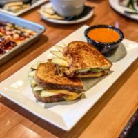 Apple and Bacon Grilled Cheese · Thinly sliced green apples, thick cut bacon, with cheddar and gouda cheese.