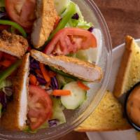 Country Chicken Salad · A blend of lettuce, tomato, cucumber, green pepper and black olives topped with sliced bread...