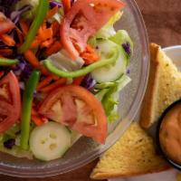 Garden Salad · Lettuce, tomato, cucumber, and green pepper served with croutons and your choice of dressing...