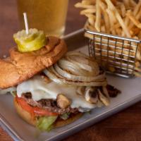 Railroad Street · This huge 1/2 lb. burger is topped with loads of mushrooms, grilled onions, lettuce, tomato ...
