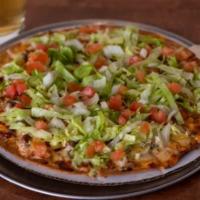 Taco Pizza · A crisp pizza crust with sour cream, salsa and taco meat, covered with a blendof cheddar and...