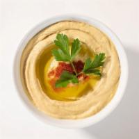 Traditional Hummus (8 oz) · Homemade creamy hummus prepared daily - a top seller and a crowd favorite. (vegan, nut free,...