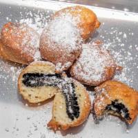 Fried Oreos · 6pc Oreo dipped in batter and fried to a golden brown, our fried Oreos definitely add a new ...