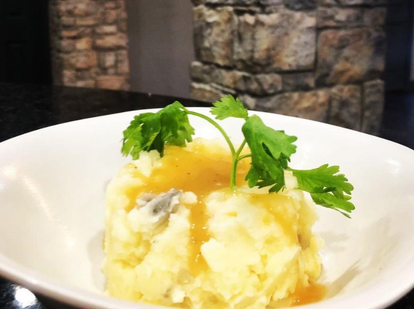 Mashed Potatoes · Creamy potatoes mixed with milk, butter, and seasoning. 
