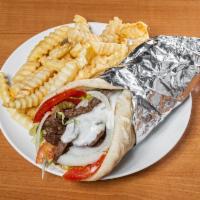 Gyro Wrap · Grilled lamb served hot on a pita with lettuce, onions and tzatziki sauce.