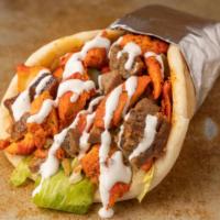 Mix Gyro · Chicken and lamb on pita bread sandwich with your choice of salad and sauce 
PlEASE Tell US ...