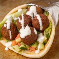 Falafel sandwich  · PlEASE Tell US YOUR Choice OF Salad and Sauce(white sauce,hot sauce  barbecue sauce)in speci...