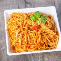 Spaghetti a la Criolla · Spaghetti with Creole sauce.