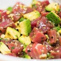 Poke Tuna Plate · Chef special sauce, sesame seeds, sesame oil, tuna chunks, avocado, and cucumber.