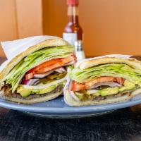 Carne Asada Torta · Grilled beef.