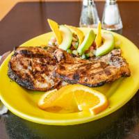 12. Chuletas a la Mexicana Platter · Pork chops sauteed with tomatoes, onions & jalapenos.