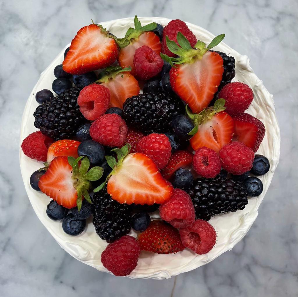 Mixed Berry Cake · 24 HR NOTICE REQUIRED. Light vanilla sponge cake layered with Chantilly cream and scattered with fresh mix of berries