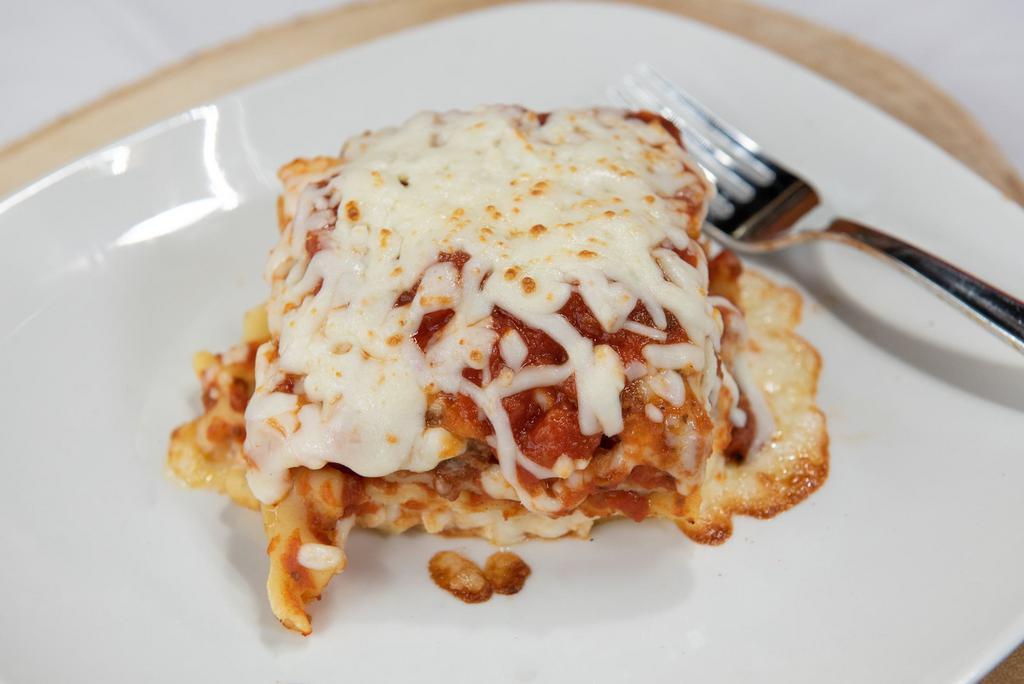 Meat Lasagna · Layered dish with wide flat pasta. 